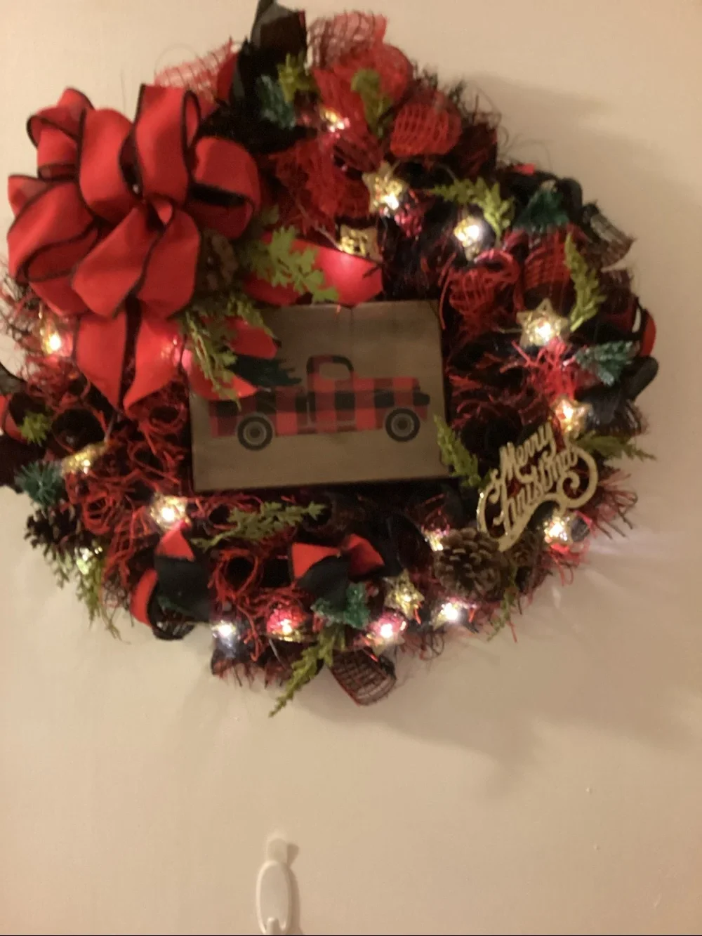 Homemade Christmas wreath with truck and battery operated lights